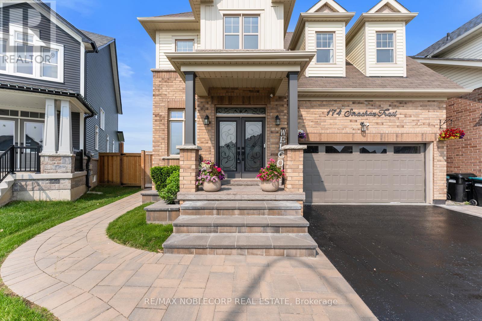 174 Strachan Trail, New Tecumseth (Beeton), Ontario  M6J 2S9 - Photo 4 - N12203537
