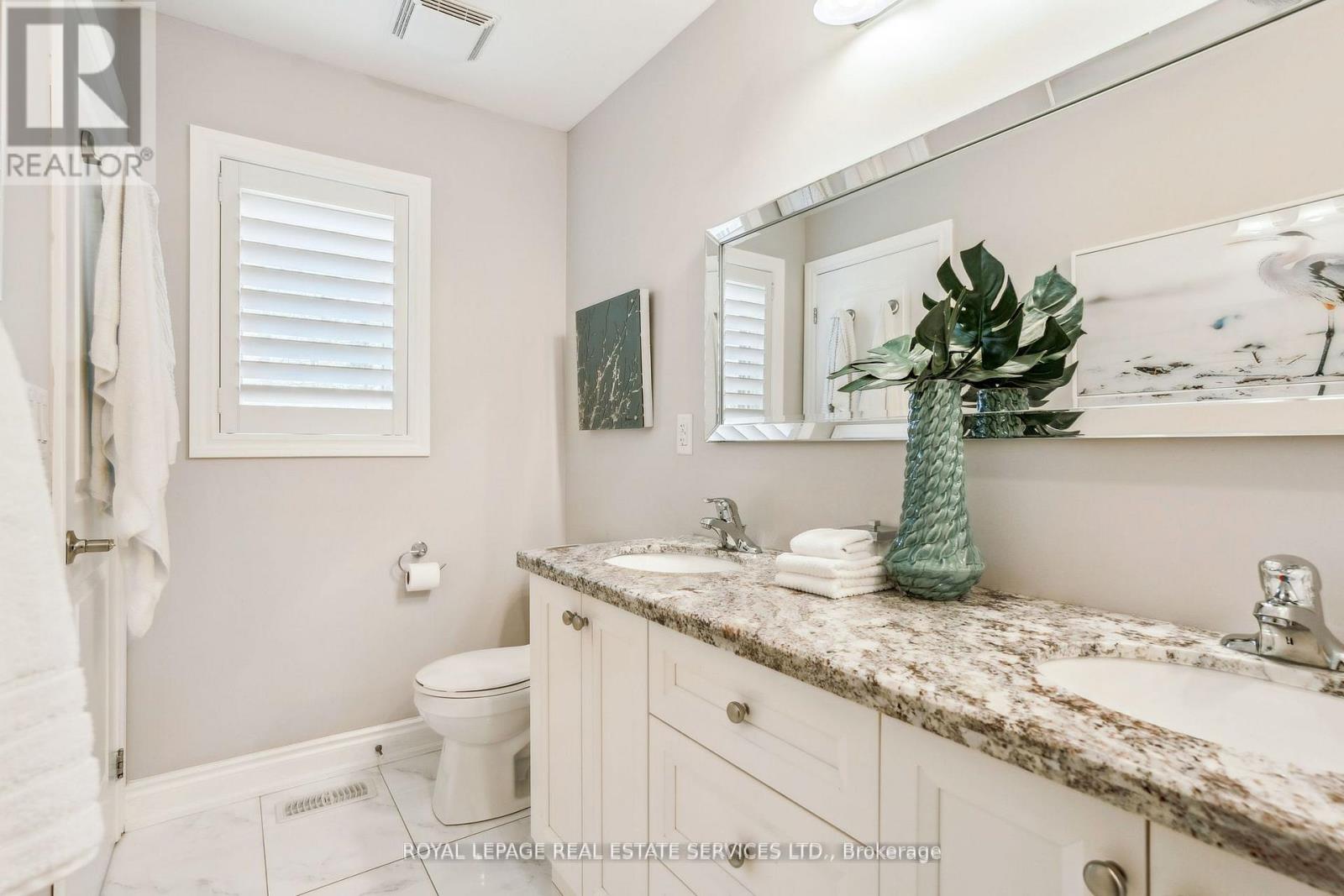 63 Long Branch Avenue, Toronto, Ontario  M8W 3J3 - Photo 16 - W12203530