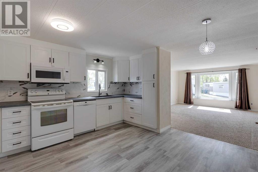 290, 99 Arbour Lake Road Nw, Calgary, Alberta  T3G 4E4 - Photo 1 - A2217222