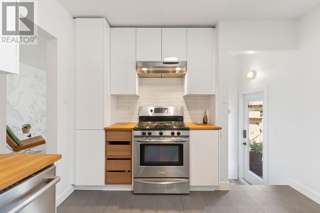 1303 Rosehill Drive Nw, Calgary, Alberta  T2K 1M3 - Photo 10 - A2227230