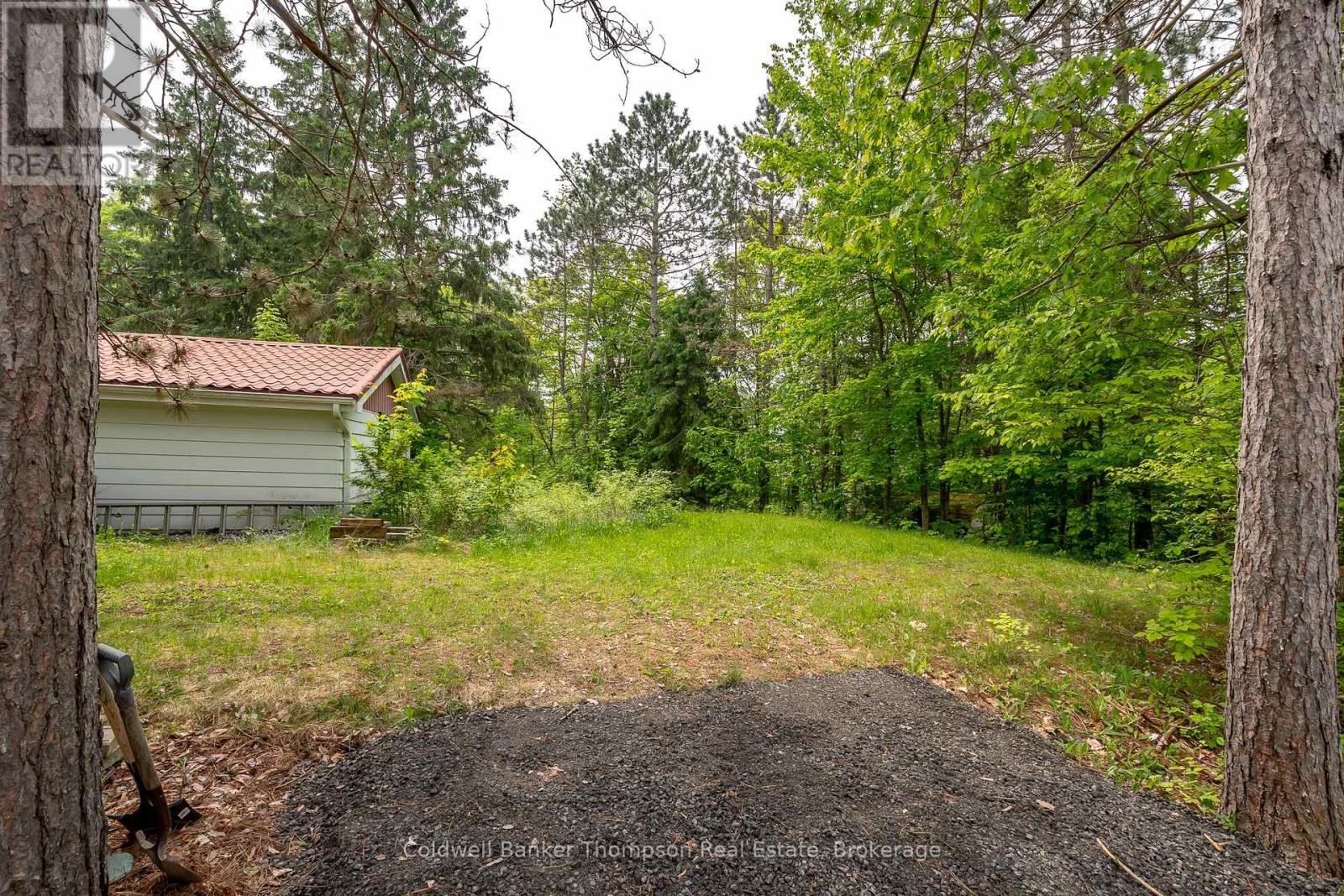 211 Lakeshore Road, Huntsville, Ontario  P1H 1Y8 - Photo 4 - X12203811
