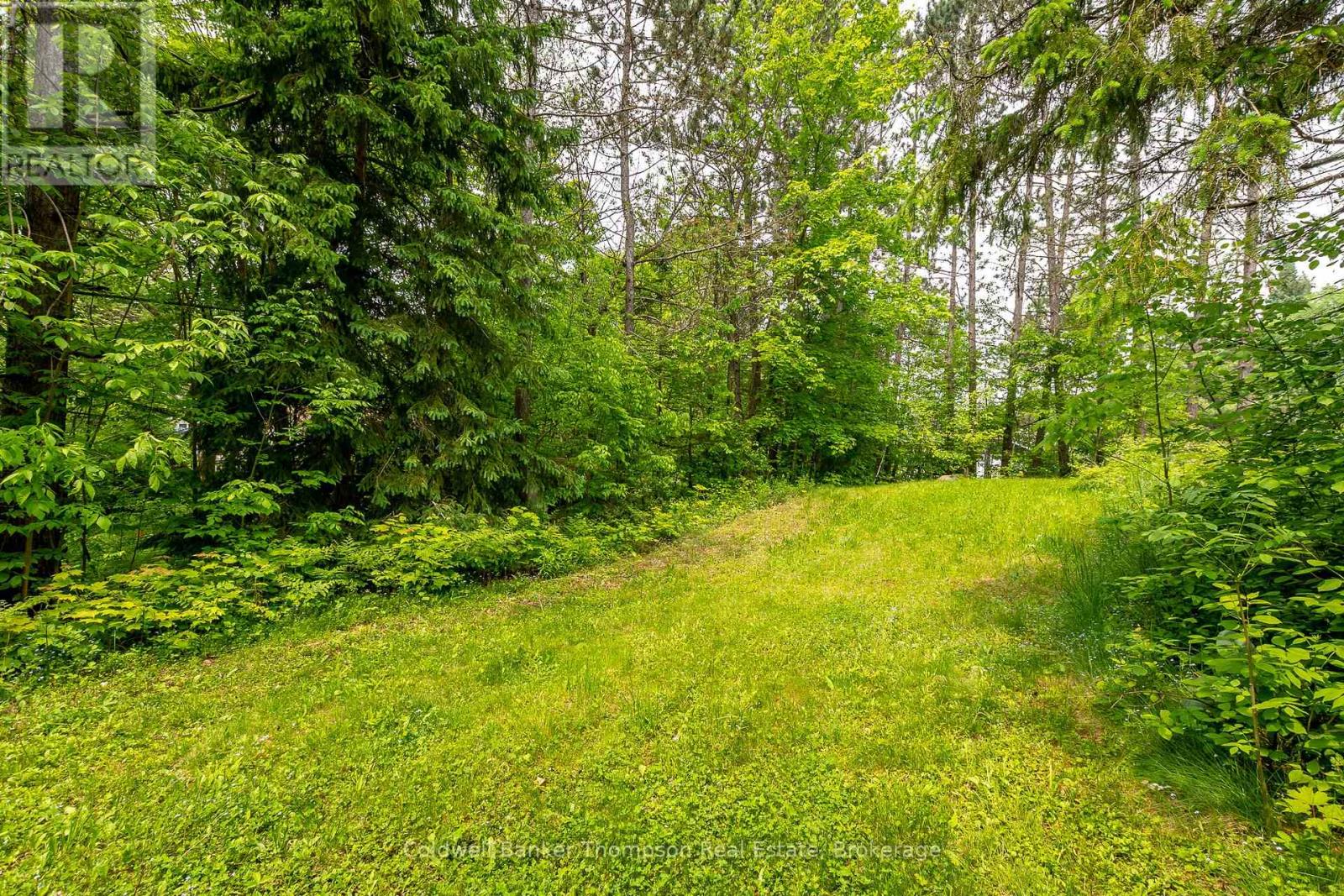 211 Lakeshore Road, Huntsville, Ontario  P1H 1Y8 - Photo 9 - X12203811