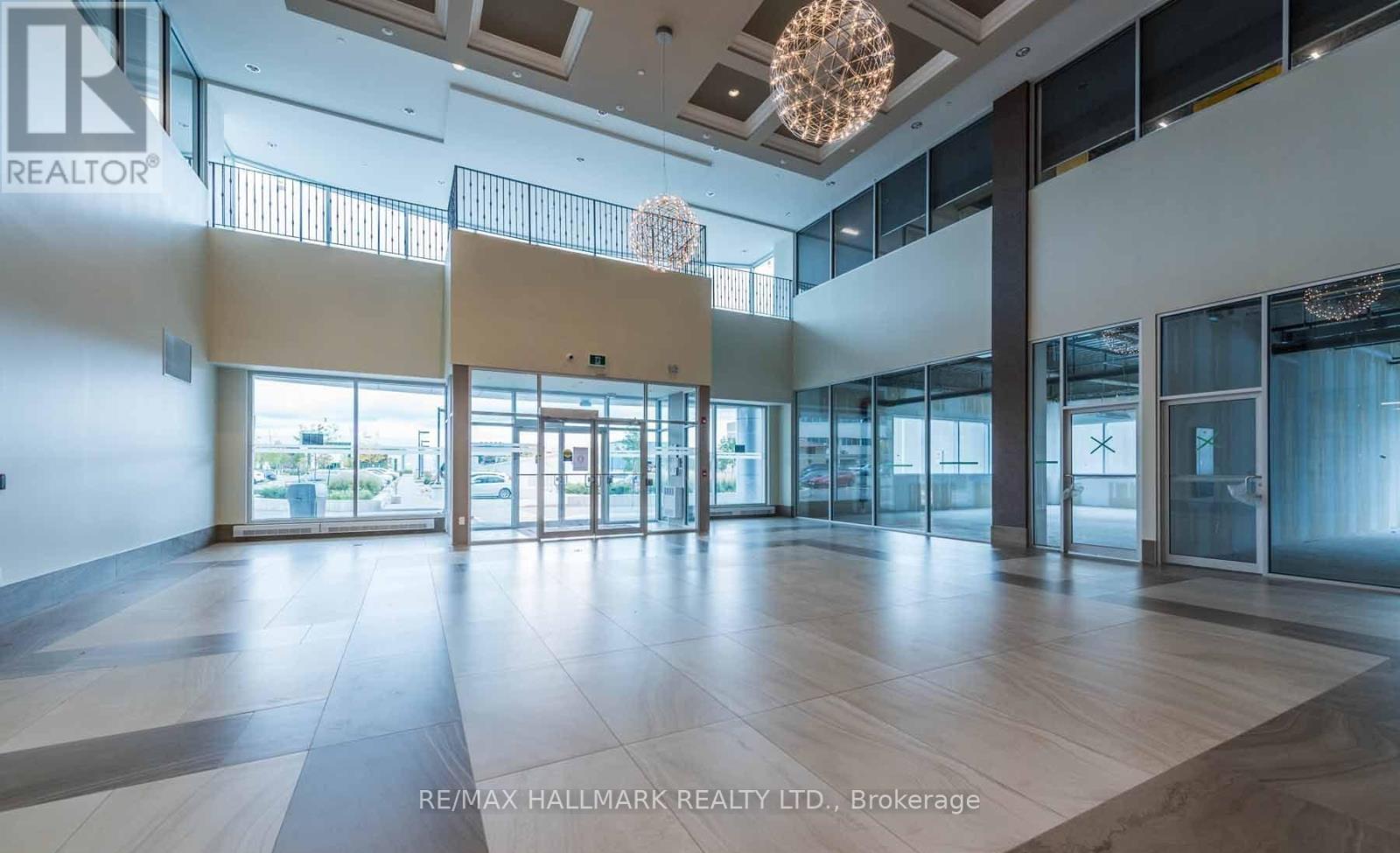 407 - 218 Export Boulevard, Mississauga, Ontario  L5S 1Y4 - Photo 2 - W12203923