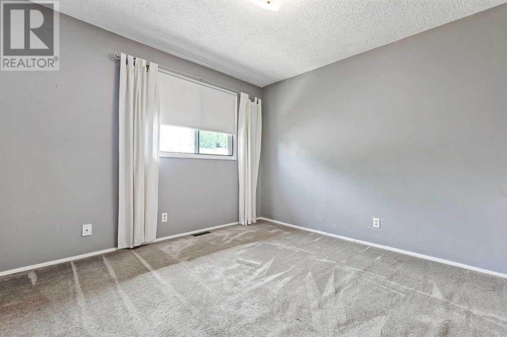 154 Woodglen Grove Sw, Calgary, Alberta  T2W 4S8 - Photo 14 - A2224798