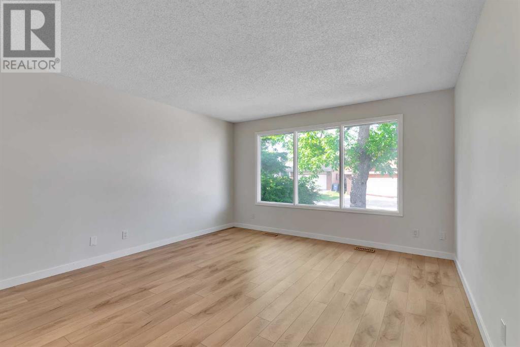 55 Sandstone Way Nw, Calgary, Alberta  T3K 3A1 - Photo 6 - A2227112