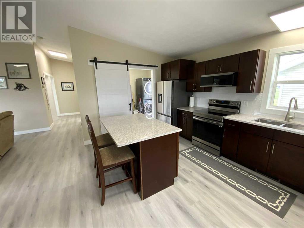 25 Cherry Lane Se, Three Hills, Alberta  T0M 2A0 - Photo 3 - A2223989