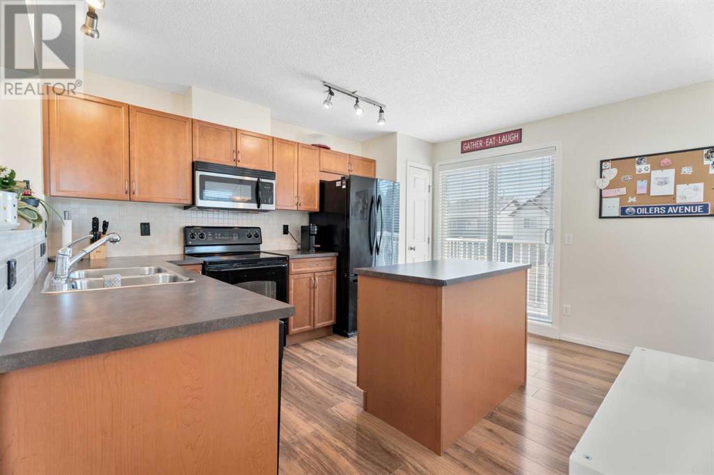 3324 New Brighton Gardens Se, Calgary, Alberta  T2Z 0A2 - Photo 11 - A2226430