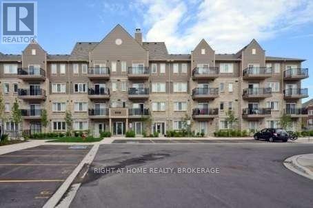 408 - 5705 Long Valley Road, Mississauga, Ontario  L5M 0M3 - Photo 1 - W12204131