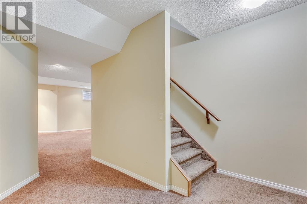 596 Cougar Ridge Drive Sw, Calgary, Alberta  T3H 5A4 - Photo 37 - A2216232