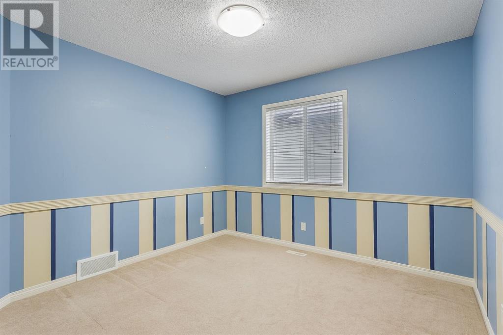 596 Cougar Ridge Drive Sw, Calgary, Alberta  T3H 5A4 - Photo 25 - A2216232