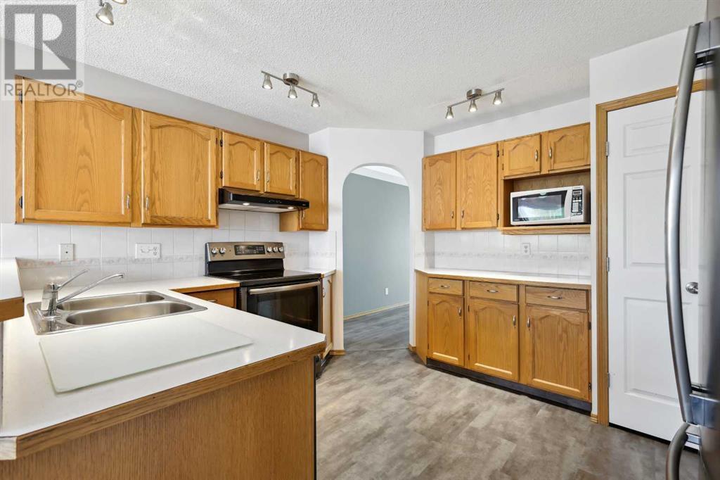 92 Harvest Park Road Ne, Calgary, Alberta  T3K 4H8 - Photo 8 - A2226311