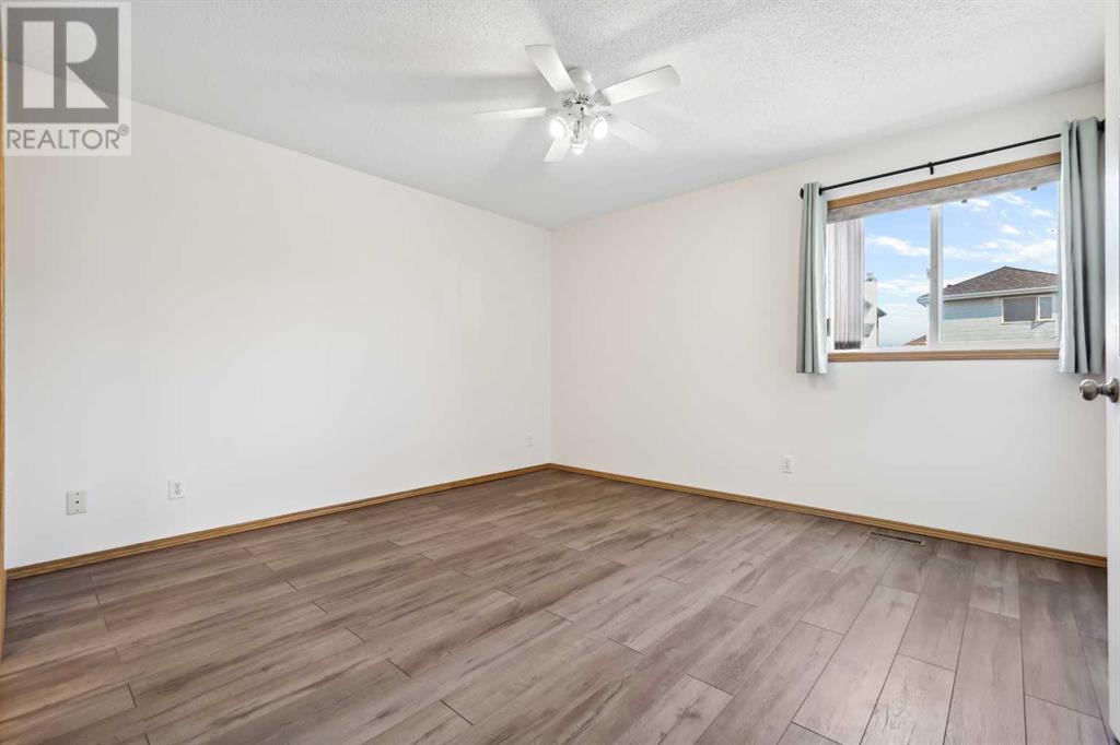 92 Harvest Park Road Ne, Calgary, Alberta  T3K 4H8 - Photo 14 - A2226311