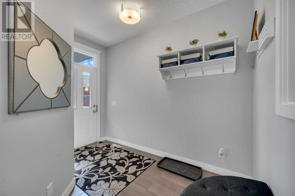 58 Redstone Mews Ne, Calgary, Alberta  T3N 0N5 - Photo 3 - A2228514