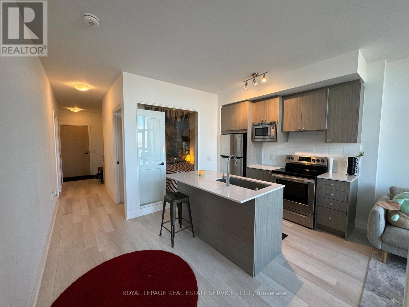301 - 60 George Butchart Drive, Toronto, Ontario  M3K 0E1 - Photo 5 - W12204603