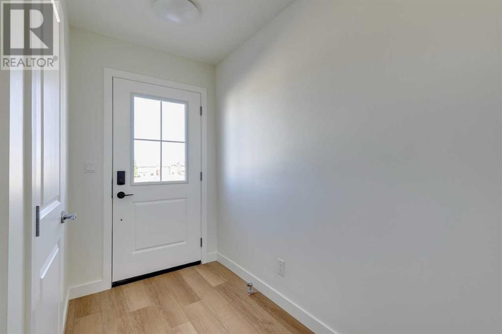 1414, 25 Wildwoods Court Sw, Airdrie, Alberta  T4B 3M9 - Photo 2 - A2224167