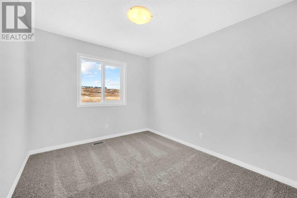 619 Wolf Willow Drive Se, Calgary, Alberta  T2X 5P9 - Photo 21 - A2201158