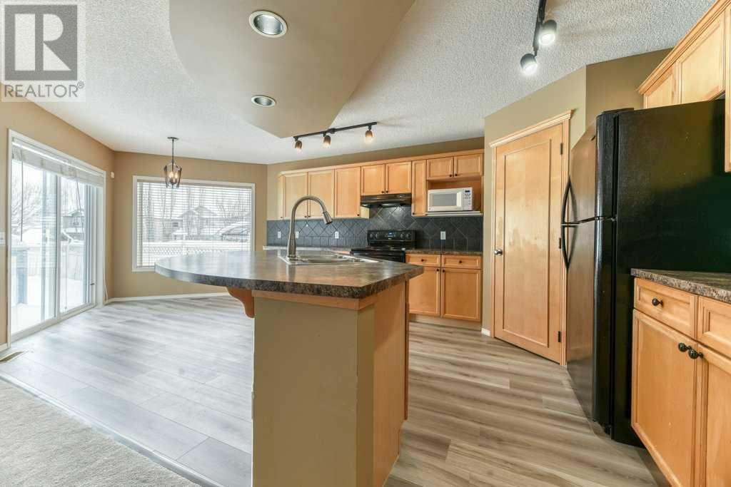 82 Tuscany Ravine Road Nw, Calgary, Alberta  T3L 2R9 - Photo 7 - A2181629