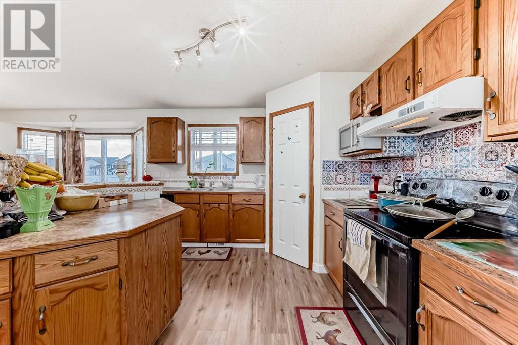 117 Taracove Crescent Ne, Calgary, Alberta  T3J 4R2 - Photo 8 - A2213296