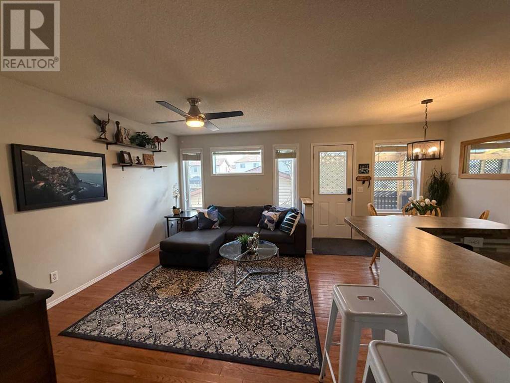 105 Cimarron Grove Road, Okotoks, Alberta  T1S 2H1 - Photo 4 - A2227400