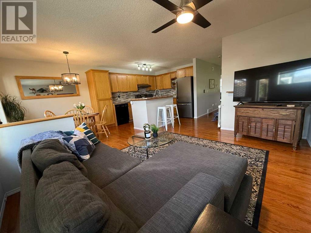 105 Cimarron Grove Road, Okotoks, Alberta  T1S 2H1 - Photo 2 - A2227400
