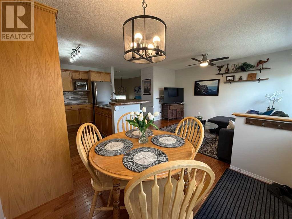 105 Cimarron Grove Road, Okotoks, Alberta  T1S 2H1 - Photo 3 - A2227400