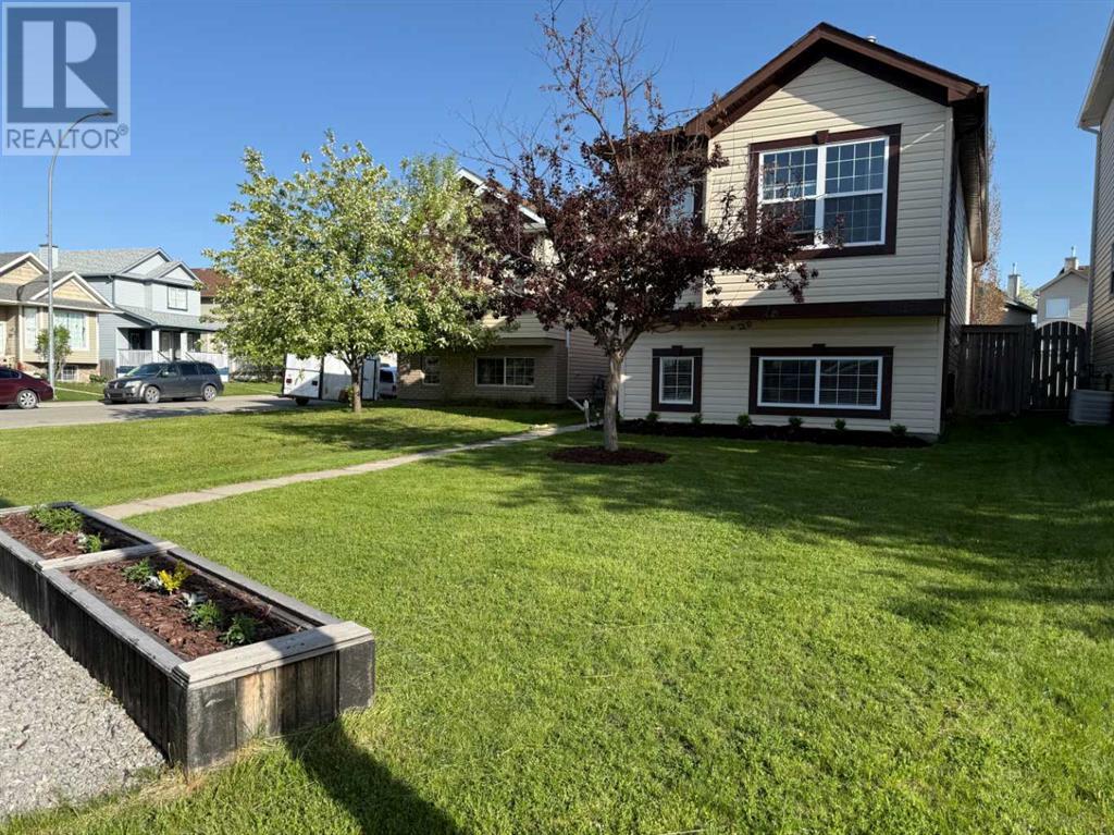 105 Cimarron Grove Road, Okotoks, Alberta  T1S 2H1 - Photo 1 - A2227400