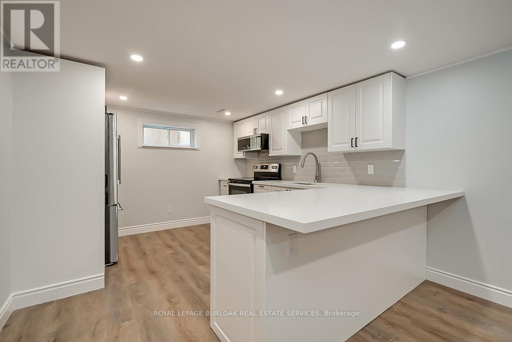 Lower - 66 East 41st Street, Hamilton, Ontario  L8T 2Z6 - Photo 8 - X12204840