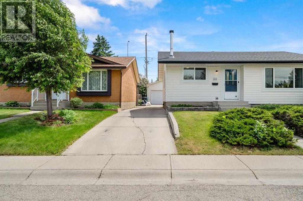 264 Bracewood Road Sw, Calgary, Alberta  T2W 3C1 - Photo 2 - A2228789