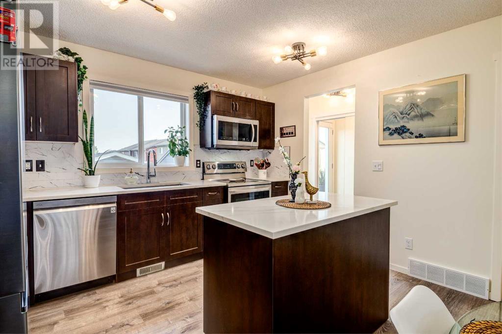 24 Panamount Avenue Nw, Calgary, Alberta  T3K 0P8 - Photo 11 - A2227496