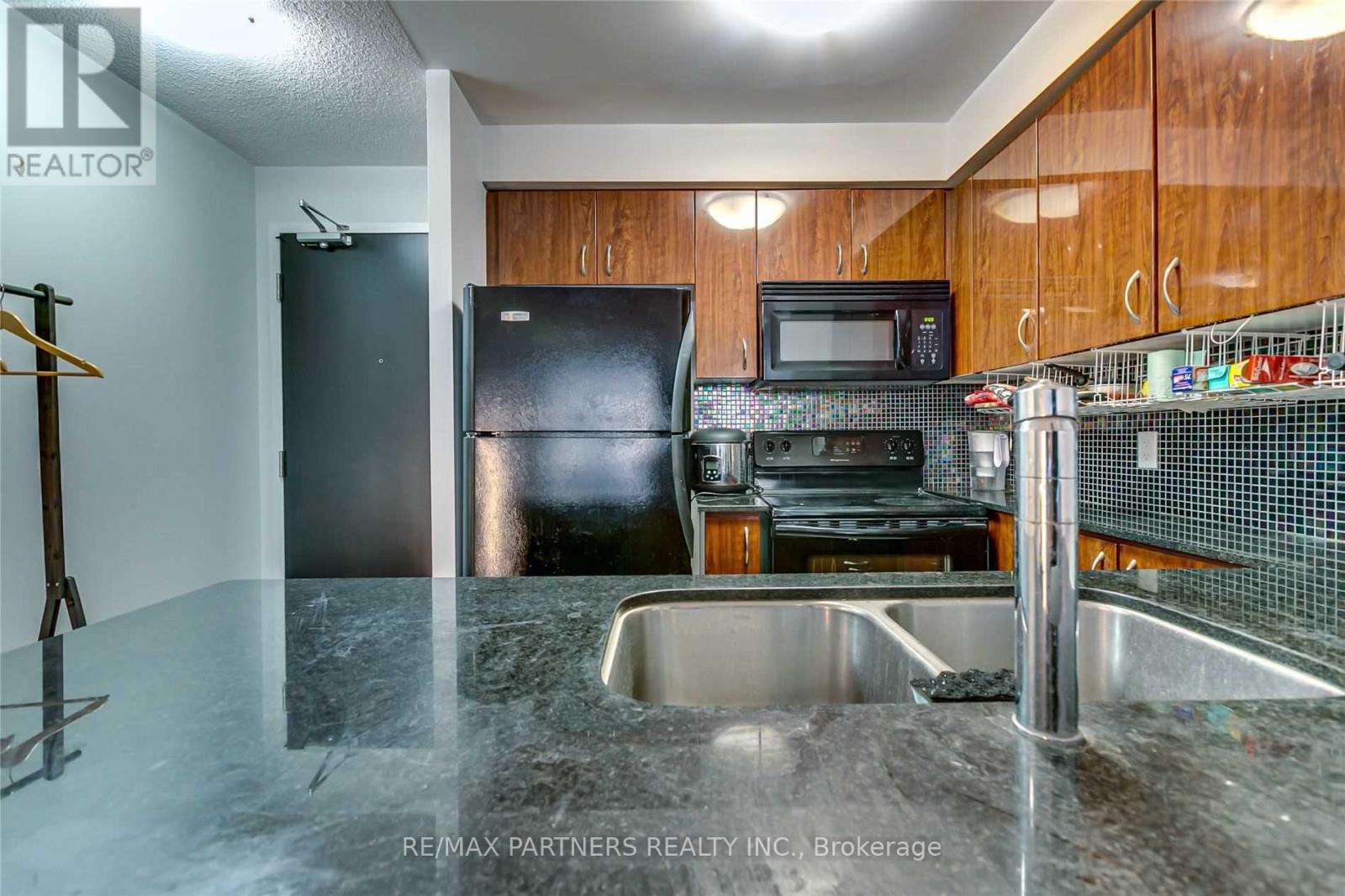 606 - 5791 Yonge Street, Toronto (Newtonbrook East), Ontario  M2M 0A8 - Photo 2 - C12205081