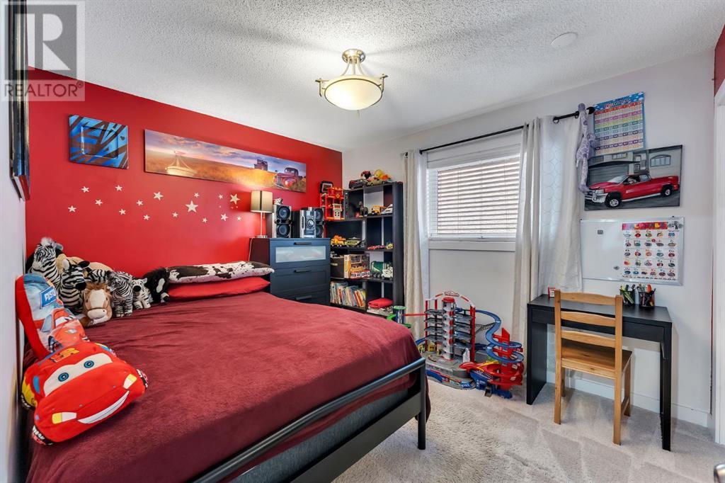 83 Harvest Lake Crescent Ne, Calgary, Alberta  T3K 3Y8 - Photo 19 - A2217059