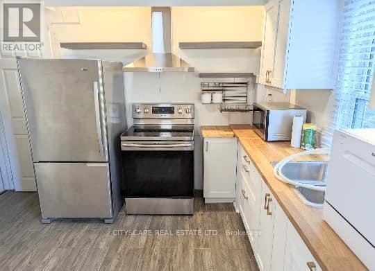 Main Floor & Lower Level - 791 Dufferin Street, Toronto, Ontario  M6H 3K8 - Photo 8 - C12205172