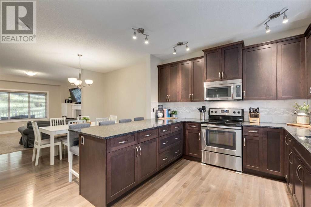 196 Heartland Way, Cochrane, Alberta  T4C 0M5 - Photo 10 - A2228898