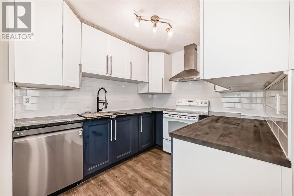 233 Sabrina Way, Calgary, Alberta  T2W 4J4 - Photo 5 - A2227508