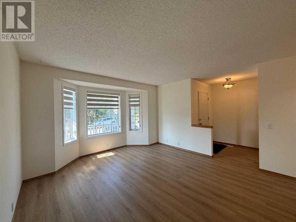 141 Harvest Gold Heights Ne, Calgary, Alberta  T3K 4H2 - Photo 3 - A2228904