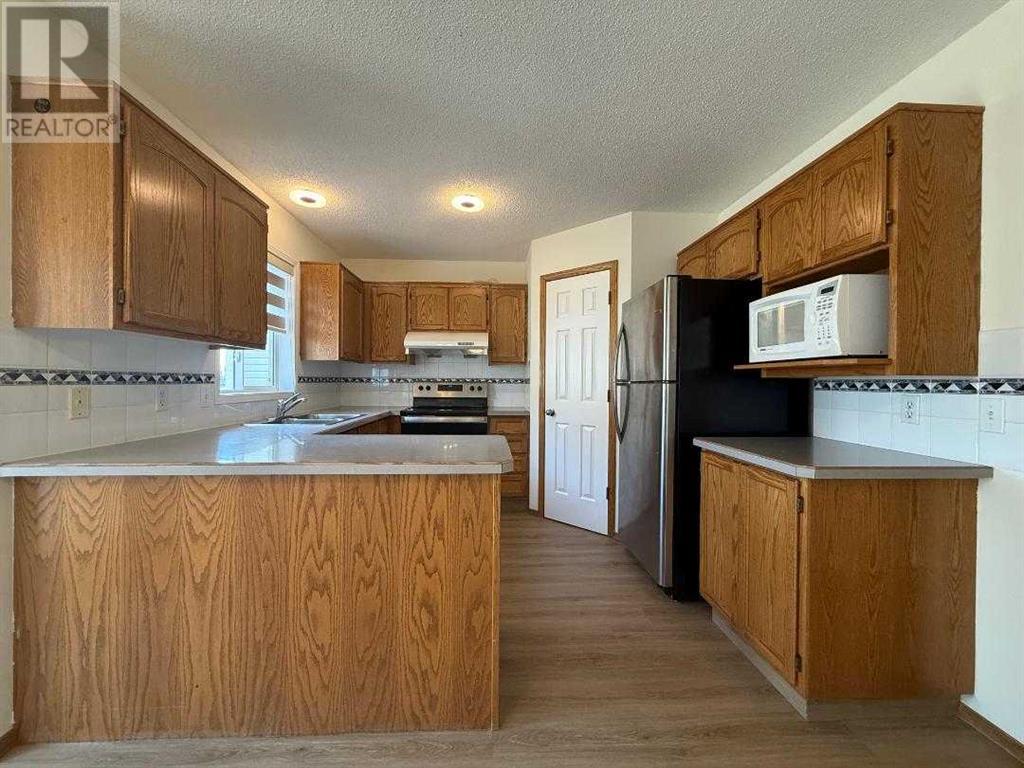 141 Harvest Gold Heights Ne, Calgary, Alberta  T3K 4H2 - Photo 6 - A2228904