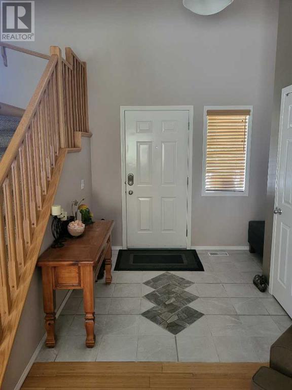 81 Tusslewood Drive Nw, Calgary, Alberta  T3L 2R7 - Photo 4 - A2228155