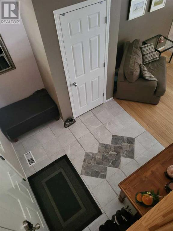 81 Tusslewood Drive Nw, Calgary, Alberta  T3L 2R7 - Photo 5 - A2228155