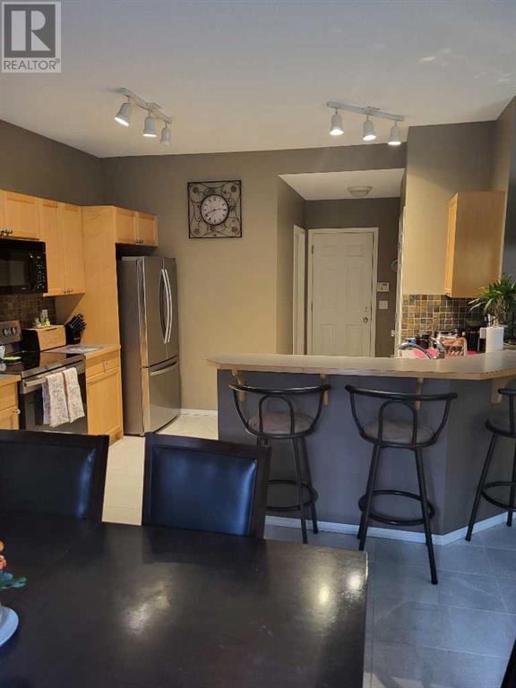 81 Tusslewood Drive Nw, Calgary, Alberta  T3L 2R7 - Photo 12 - A2228155