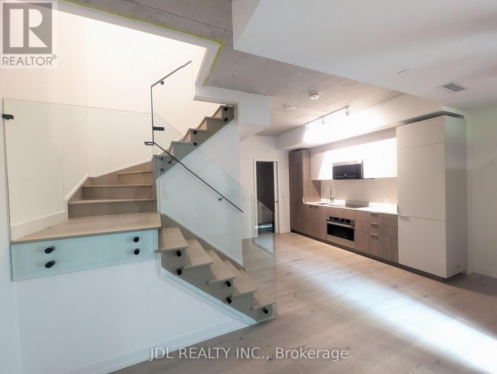 Th 115 - 28 Eastern Avenue, Toronto, Ontario  M5A 0Y2 - Photo 1 - C12205572