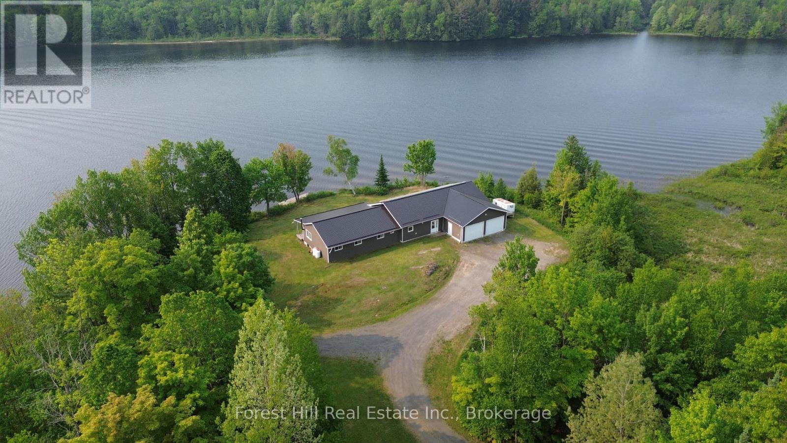 315 Little Long Lake Road, Parry Sound Remote Area, Ontario  P0H 1S0 - Photo 1 - X12205612