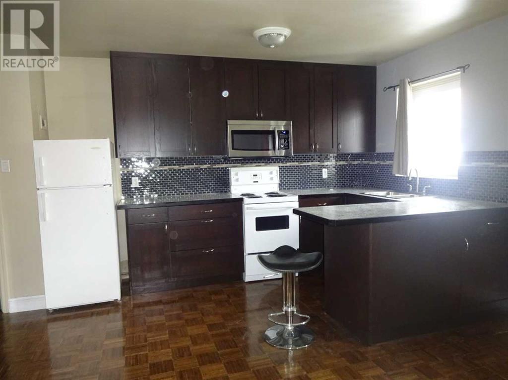 Property Listing: 204, 1027 12 Avenue Sw, Calgary, Alberta