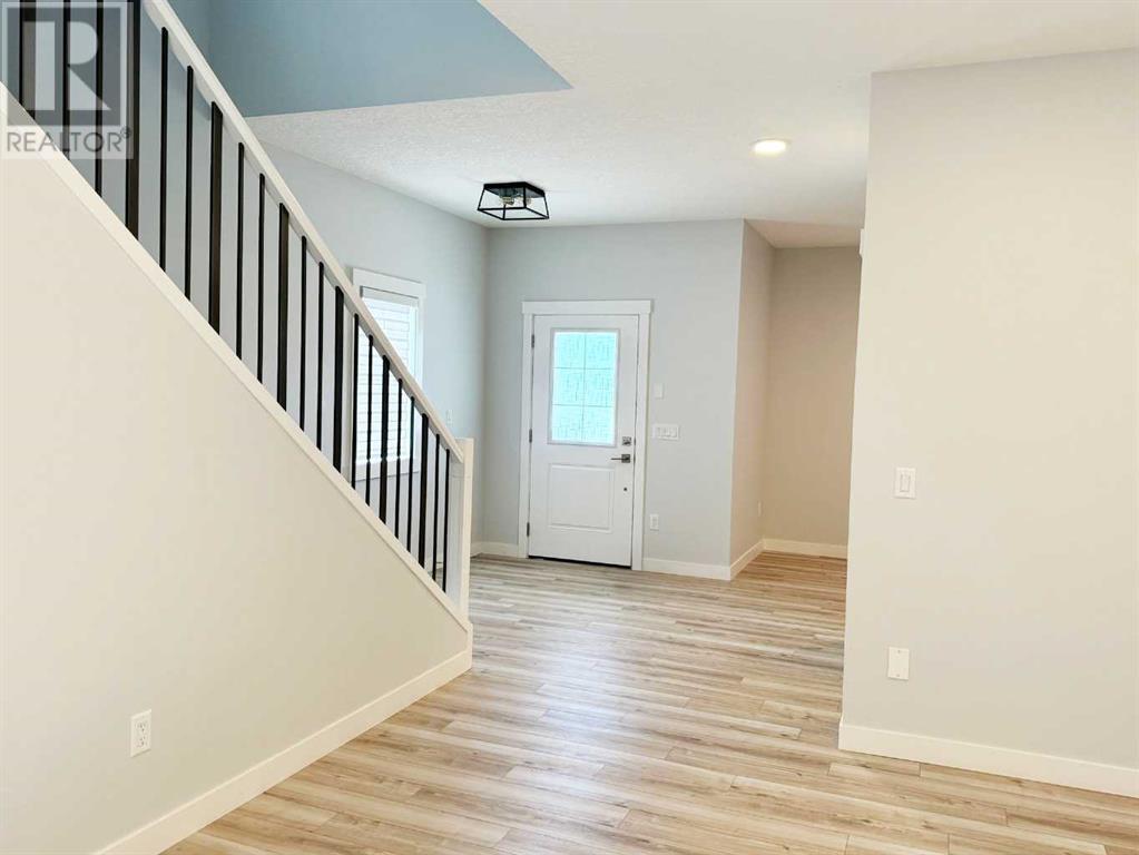 1402 Midtown Link Sw, Airdrie, Alberta  T4B 5K9 - Photo 3 - A2228400