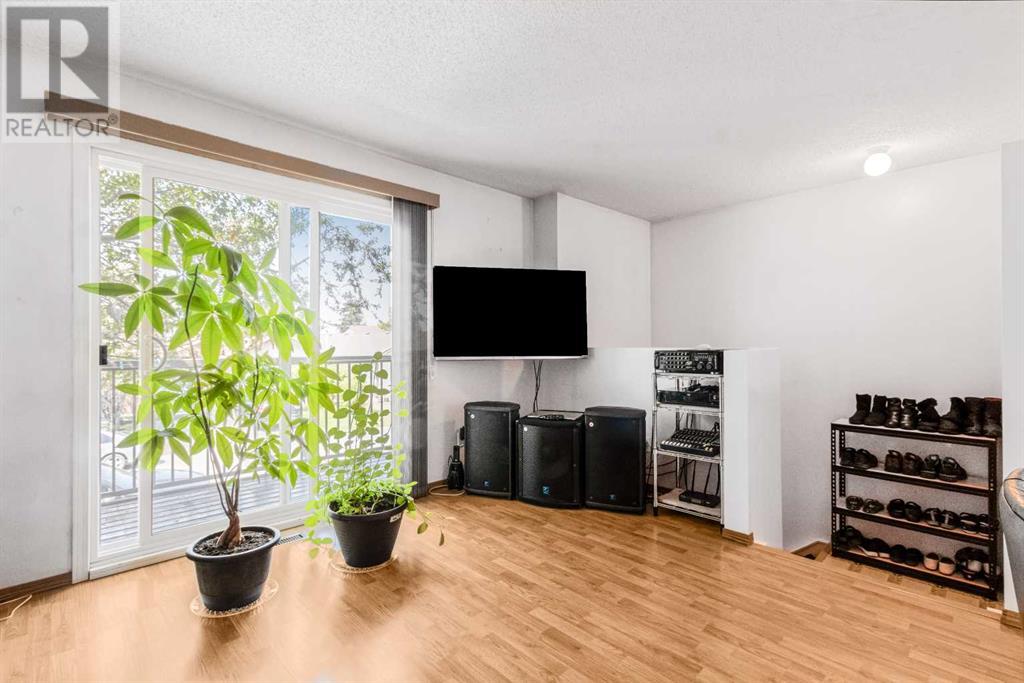 20 Abalone Way Ne, Calgary, Alberta  T2A 6Y7 - Photo 4 - A2228990
