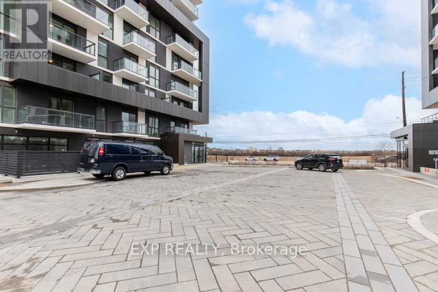505 - 335 Wheat Boom Drive, Oakville, Ontario  L6H 7Y1 - Photo 4 - W12205714