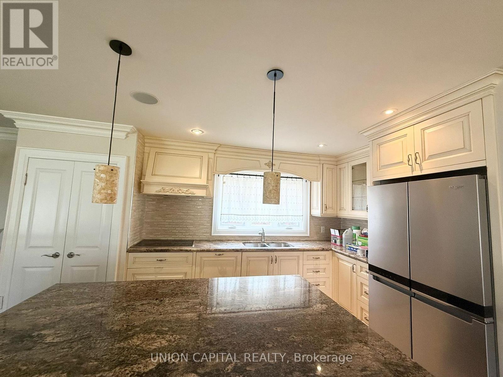 99 Wyndcliff Crescent, Toronto, Ontario  M4A 2J9 - Photo 5 - C12205779