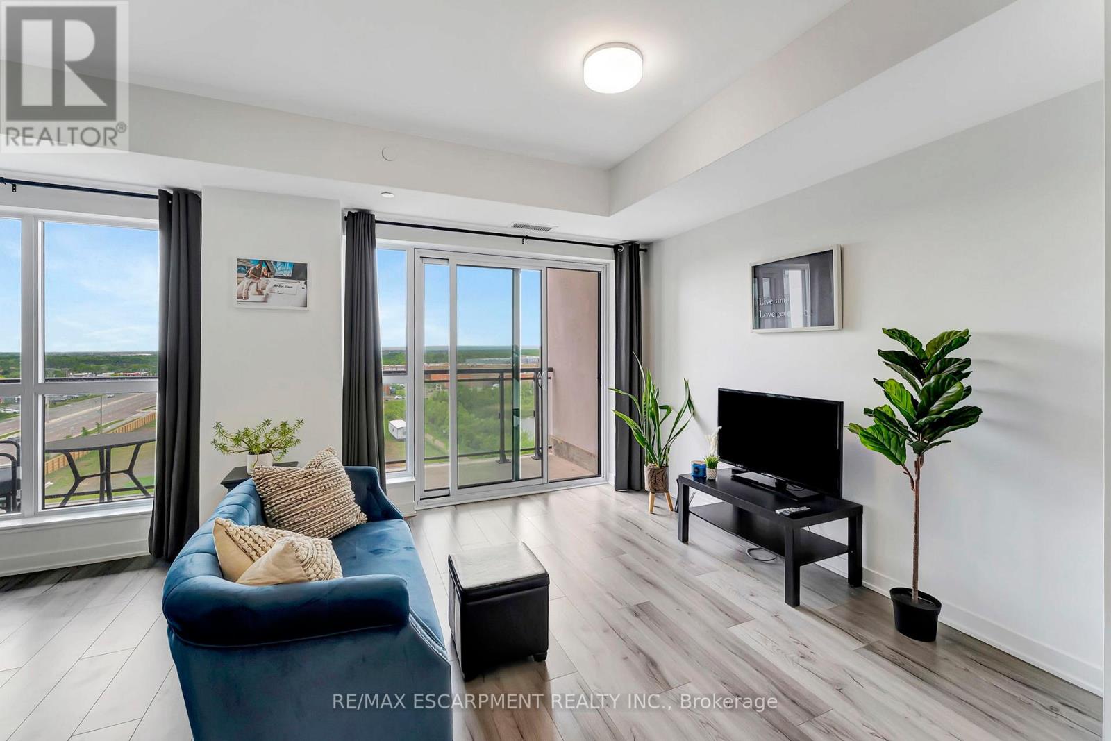 702 - 405 Dundas Street W, Oakville (Go Glenorchy), Ontario  L6M 5P9 - Photo 10 - W12205842