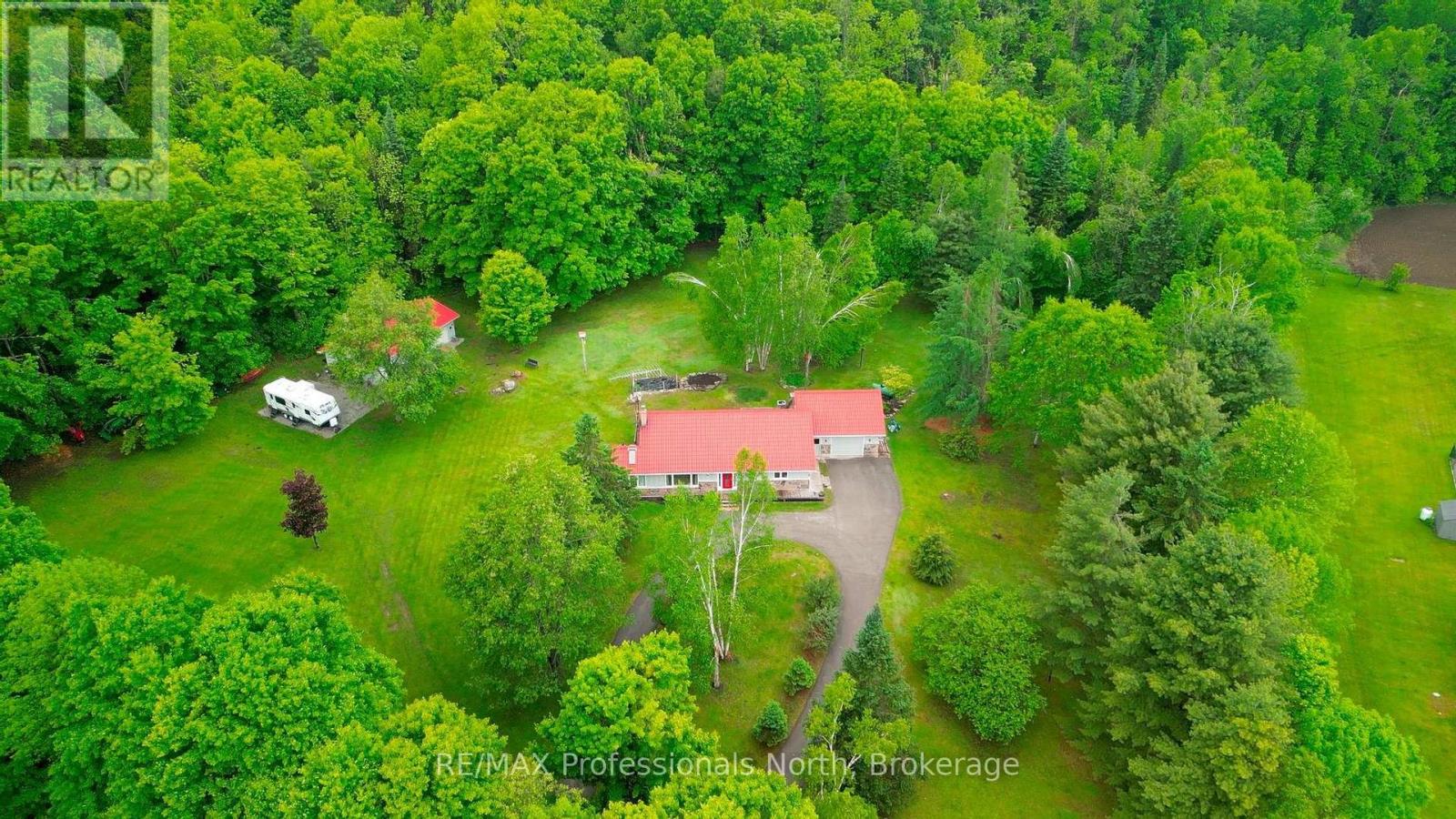 1006 Tennyson Road, Minden Hills, Ontario  K0M 2K0 - Photo 2 - X12206061