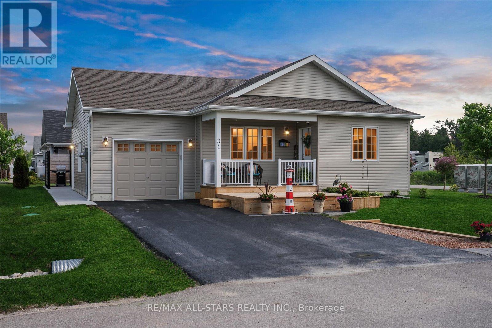 31 Reynolds Drive, Ramara, Ontario  L3V 8K1 - Photo 1 - S12206681