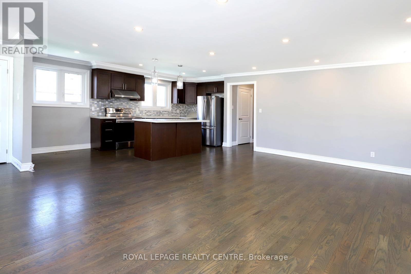 40 Summerfield Crescent, Toronto, Ontario  M9C 3X3 - Photo 2 - W12206648